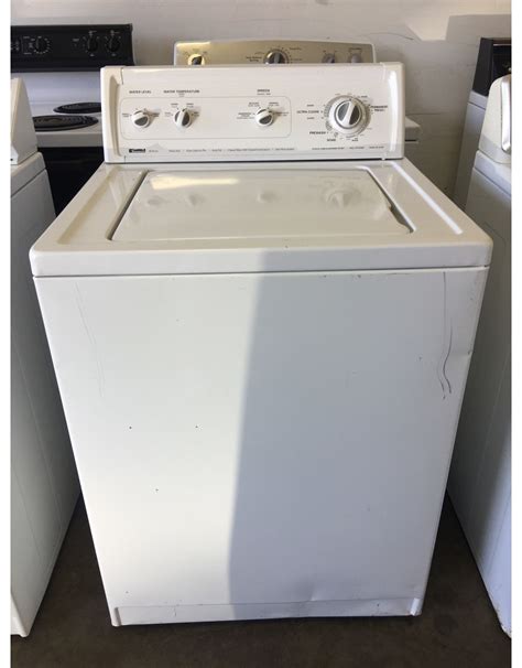 Kenmore 80 series - This video provides step-by-step repair instructions for replacing the tub counterbalance spring on a Whirlpool/Kenmore top-loading direct drive washing mach...